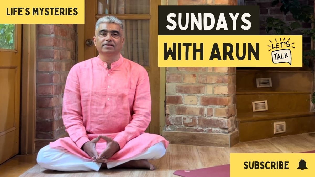 Sundays with Arun episode thumbnail — Arun Pandala seated cross-legged on the floor in a pink kurta, hands resting in his lap