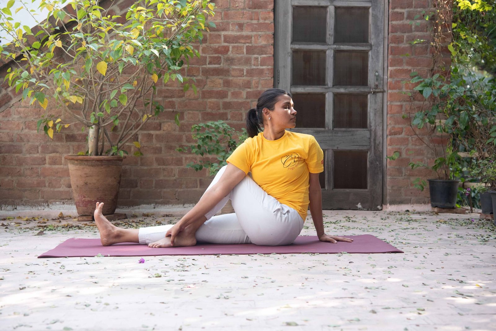 Ardh Matseyendrasana (Half spinal twist)